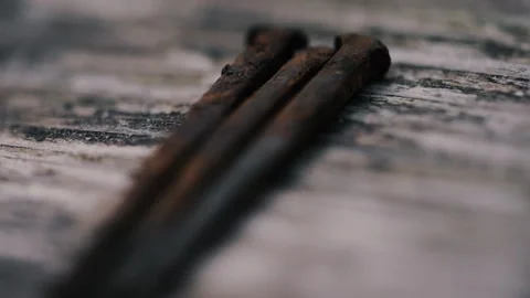 3 old rusty nails for a cross of Jesus Stock Footage 271198539