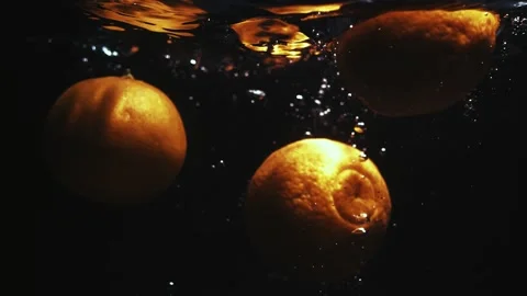 3 Oranges Dropping in Slow Motion Stock Footage 300892878