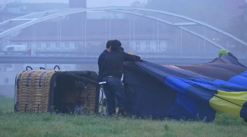 3 People Are Preparing to Fly a Balloon Opole. the Balloon is Inflated. Stock Footage 68852350