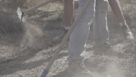 3 people digging and raking Stock Footage 82232467