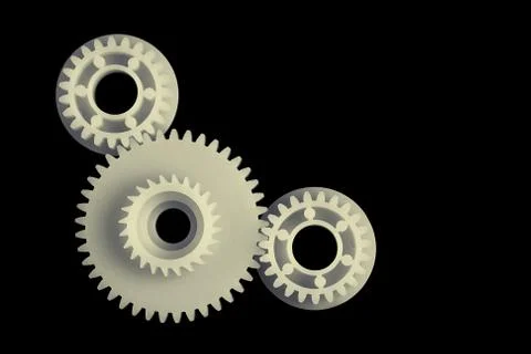 3 plastic gears on black background Stock Photos