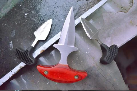 3 push dagger knivee Stock Photos