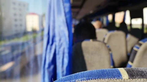 3 shots. Passengers settle in bus cabin with comfortable 库存影片 92552467