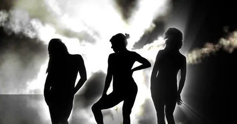3 silhouette dancers with smoke 4k Stock Footage