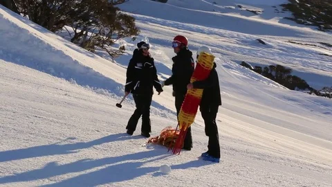 3 Skiers Talking in Snow Stock Footage 81882268