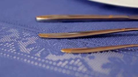 3 spoons catlery on the table Stock Footage 72471632