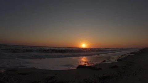3 step timelapse. Sea sunset with solar flairs and live contrail. Stock Footage 170351669
