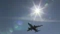 3. Sun, plane approach HD Footage