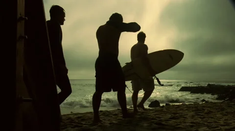 3 Surfers Walk Down Stairs Silhouette Slow Motion Stock Footage 45911225
