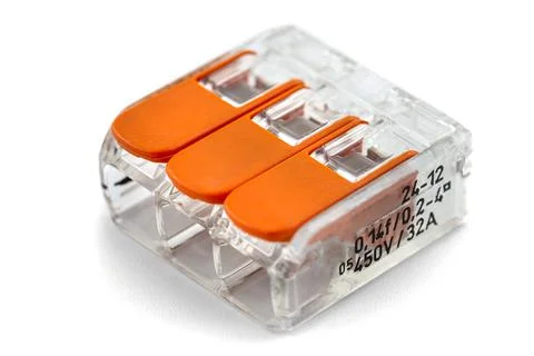 3-terminal splicing connector for stranded and solid wires for electric cable Stock Photos