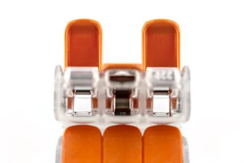 3-terminal splicing connector for stranded and solid wires for electric cable Stock Photos