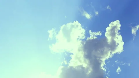 3 Time-lapse Of Clear Blue Sky With Clouds And Sunbeams Stock Footage 131658602