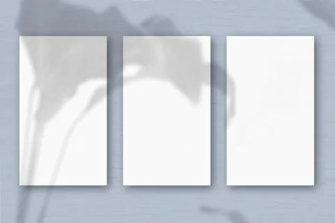3 vertical sheets of textured white paper on soft gray table background. Stock Illustration