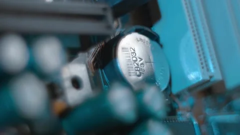 A 3 Volt lithium battery (coin) is used to power the BIOS chip and system clock  動画素材 259799241