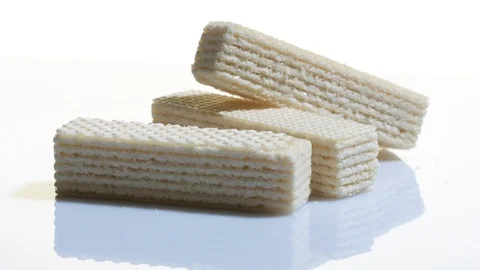 3 waffles rotate on white background Stock Footage 104144018