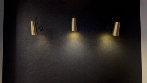 3 wall sconces flickering Stock-Footage 296487058