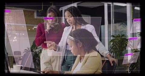 3 women team working in tech office, seated woman clicking mouse HUD overlays Stock Footage 331002258