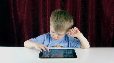 3-year old kid with an ipad Stock Footage 8972496