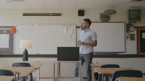 30-Something Teacher Instructs His Class Through Zoom During Pandemic Stock Footage 208786731