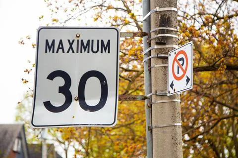 30 Speed Limit Sign and Autumn Trees Stock Photos