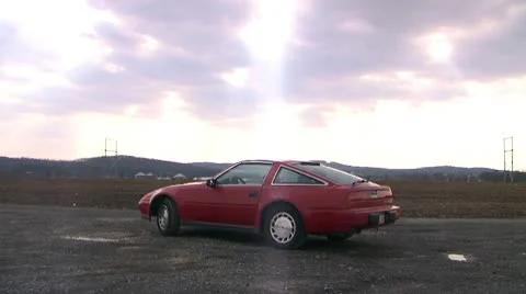 300zx dolly left WS corn field and gravel Stock-Footage 10583996