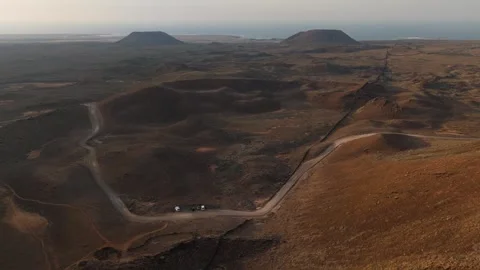 Bird's Eye View Flying Out to Coastline Over Volcanes de Bayuyo