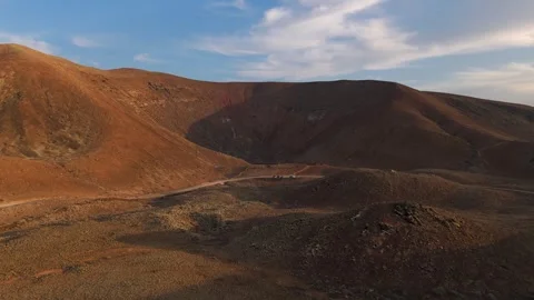 Aerial Approach to Volcanic Crater in Bayuyo, Fuerteventura at Sunset