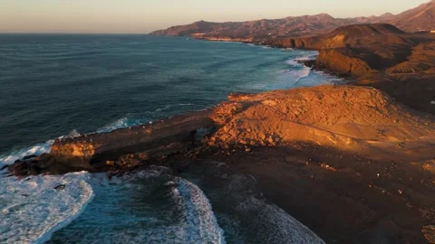 Pan Over Beach at Sunset, La Pared, Fuerteventura, Canary Islands - Aerial Drone