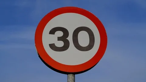 30mph roadside speed limit warning sign united kingdom Stock Footage 123901296