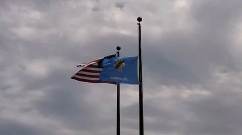 30s oklahoma(reversed) us flags cloudy Stock Footage 8848535