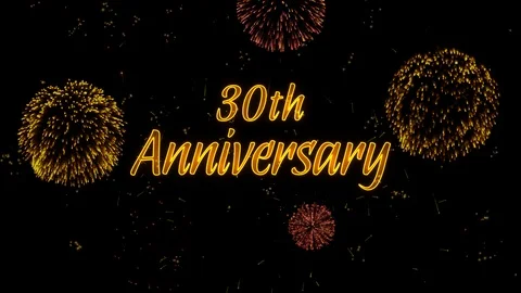 30th Anniversary Greeting text with particles, colored fireworks, sparks Stock Footage 99058683