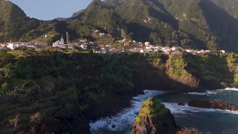 Descending View of Coastal Cliffs at Sexial, Madeira, Portugal - Aerial Drone Descending View of Coastal Cliffs at Sexial, Madeira, Portugal - Aerial Drone