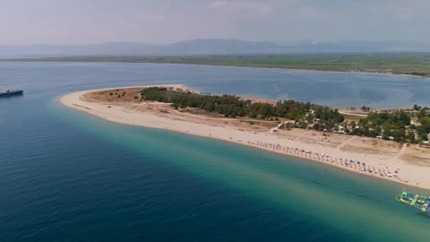 Circling Keramoti Beach, Kavala, Macedonia, Greece - Aerial Drone