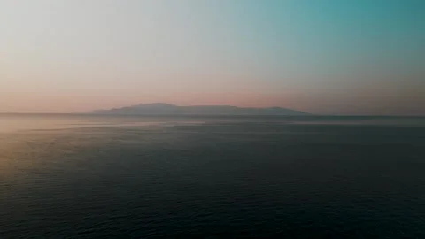 Island of Thasos at Sunset, Thracian Sea, Macedonia, Greece - Aerial Drone Island of Thasos at Sunset, Thracian Sea, Macedonia, Greece - Aerial Drone