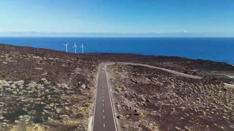 Driving through lava field in La Palma, Canary Islands - Aerial Drone Driving through lava field in La Palma, Canary Islands - Aerial Drone