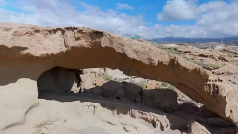 Pan Out from Arco de Tajao, Stone Arch, Tenerife, Canary Islands - Aerial Drone