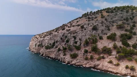 Flight over Hill on Coast at Paleochori, Thasos, Greece - Aerial Drone Flight over Hill on Coast at Paleochori, Thasos, Greece - Aerial Drone