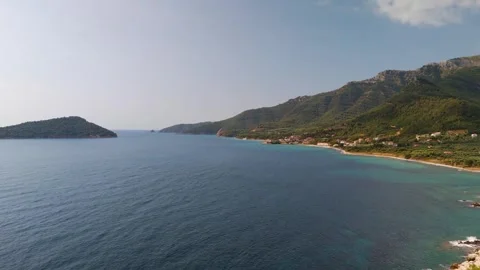Nisida Kinira and Coastline, Wide Shot, Thasos, Greece - Aerial Drone Nisida Kinira and Coastline, Wide Shot, Thasos, Greece - Aerial Drone