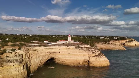 Farol de Alfanzina Lighthouse, Rising Shot, Algarve, Portugal - Aerial Drone Farol de Alfanzina Lighthouse, Rising Shot, Algarve, Portugal - Aerial Drone