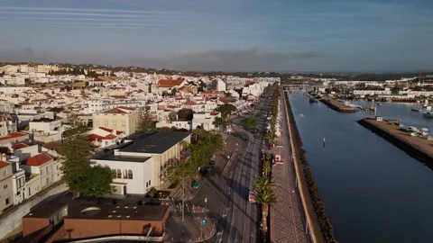 Riverfront area after sunrise in Lagos, Algarve, Portugal - Aerial Drone Riverfront area after sunrise in Lagos, Algarve, Portugal - Aerial Drone