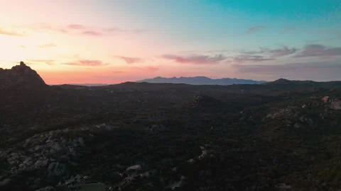Aerial Flight Over Lush Green Corsican Coastline at Dusk