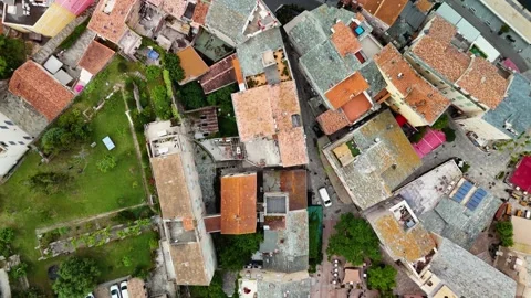 Rooftops and Streets of St Florent, Haute Corse, Corsica, France - Aerial Drone