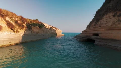 Aerial Drone Flight Out of Canal d'Amour Beach at Sunrise, Sidari Corfu Aerial Drone Flight Out of Canal d'Amour Beach at Sunrise, Sidari Corfu