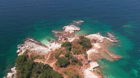 Aerial Flight Out to Sea Over Kanoni Beach Headland, Corfu Town Aerial Flight Out to Sea Over Kanoni Beach Headland, Corfu Town