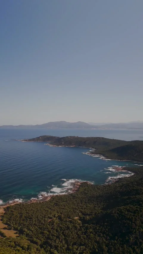 Aerial Flight to Green Isoella Peninsula Coastline, Corsica