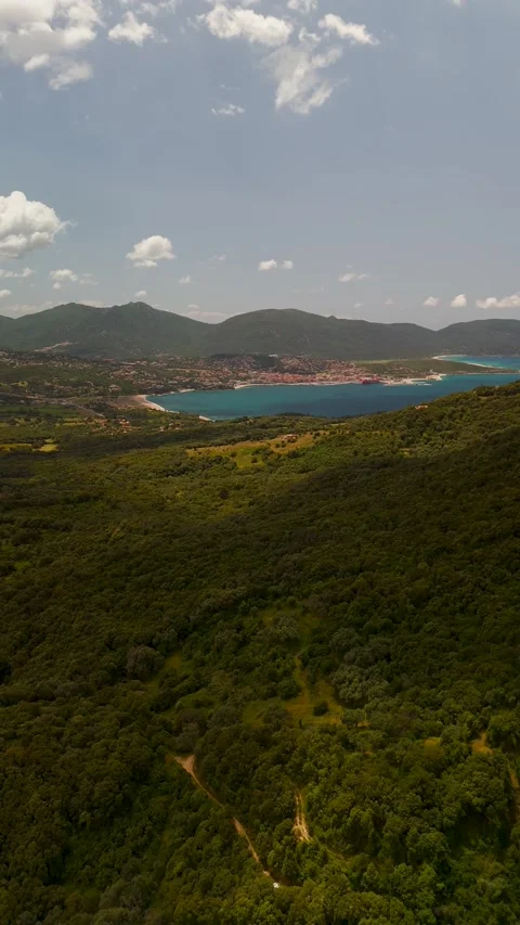 Aerial View Approaching Propriano Bay Over Lush Green Hills, Corsica
