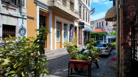 Walking Along Colorful Historic Street in Xanthi Old Town, Greece