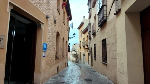 Walking Down Narrow Old Street in Segovia Towards Plaza de la Merced