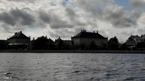 Passing the Amalienborg Palace Waterfront from a Harbor Boat Passing the Amalienborg Palace Waterfront from a Harbor Boat