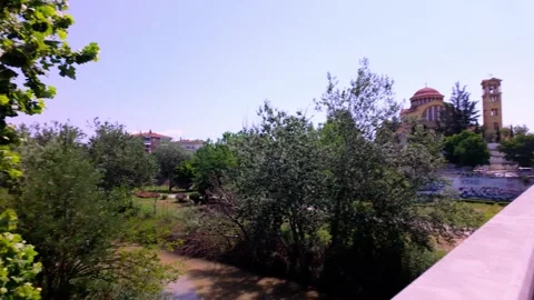 Pan Shot of Pinos River to Saint Achillius Church in Larissa, Greece